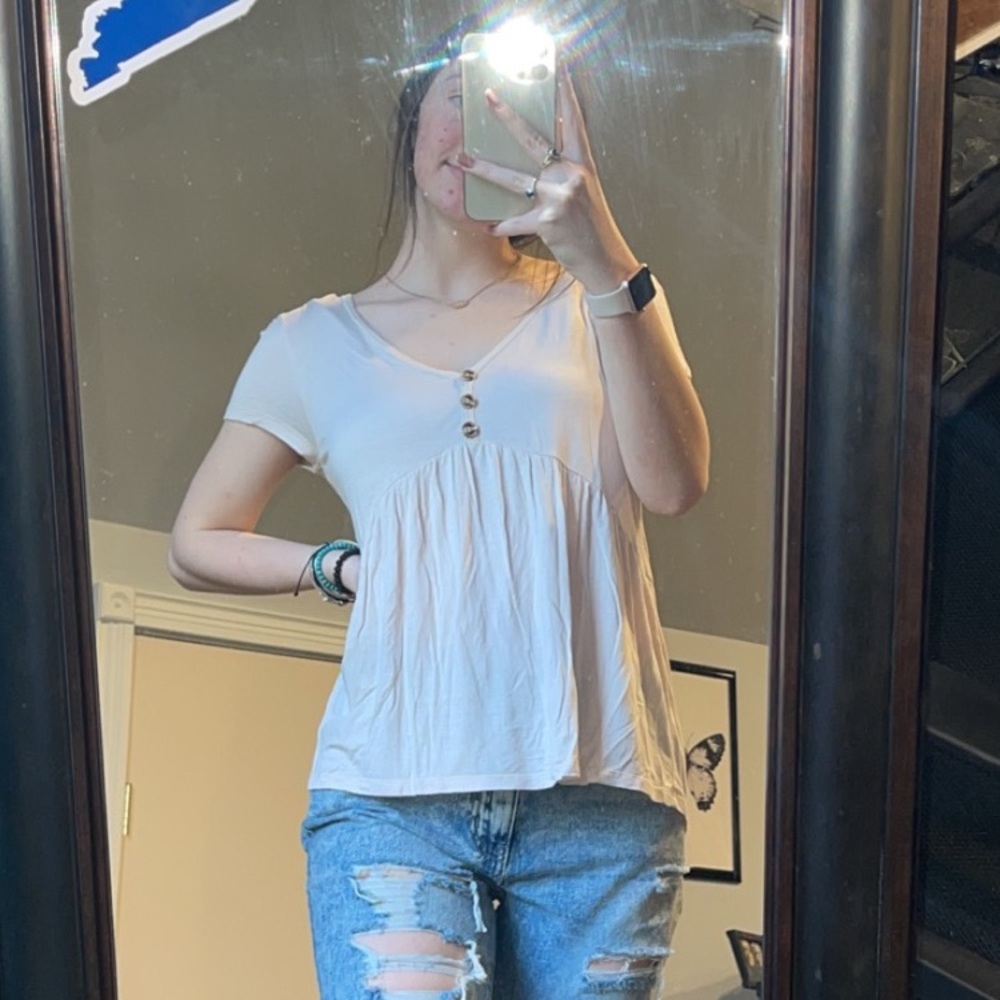 light pink shirt with buttons